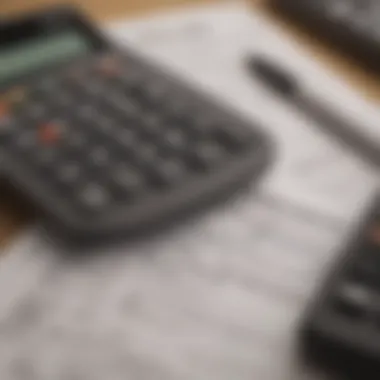 Calculator and tax forms arranged neatly